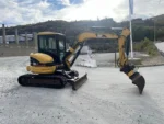 Mini-pelle Caterpillar 304 CR (2003) – Rototilt + 3 Godets inclus